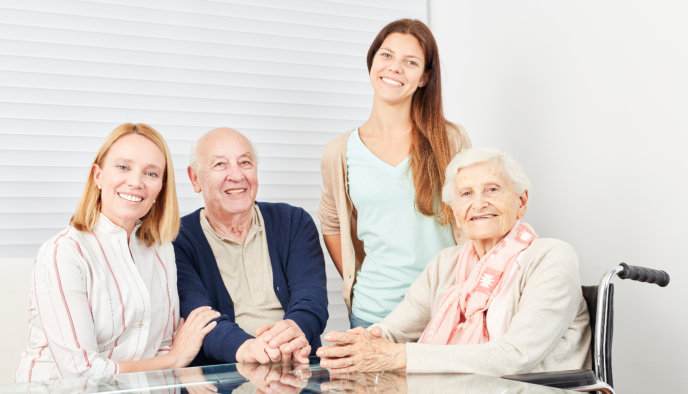 elder couple and two ladies smiling